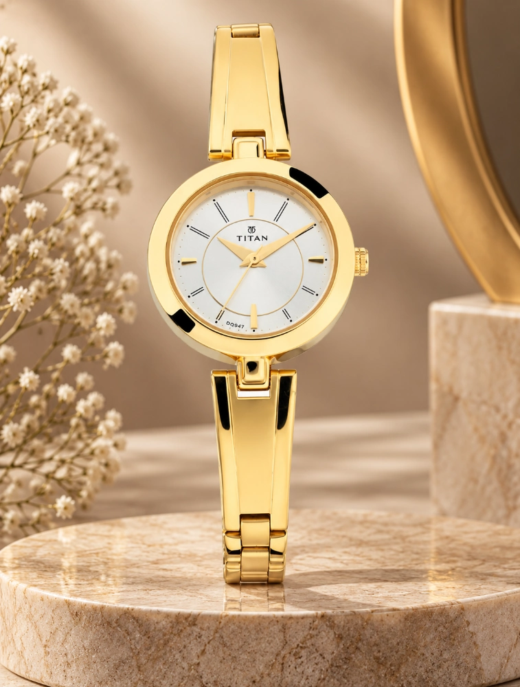 Titan Quartz Analog Silver Dial Golden Metal Strap Watch For Women NN2598YM02