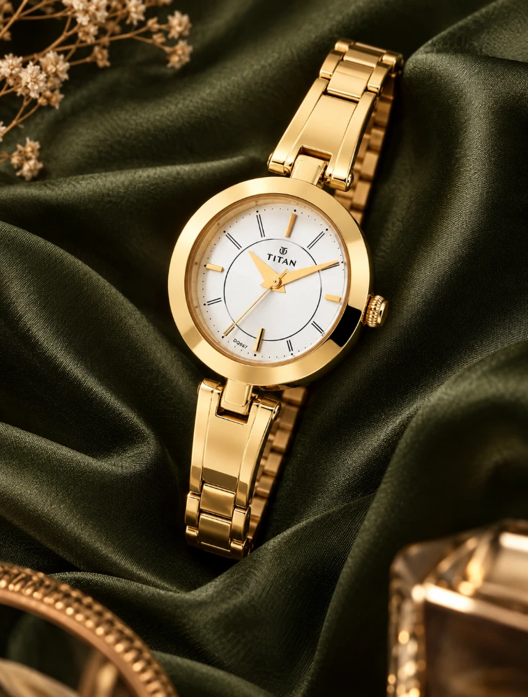 Titan Quartz Analog Silver Dial Golden Metal Strap Watch For Women NN2598YM02
